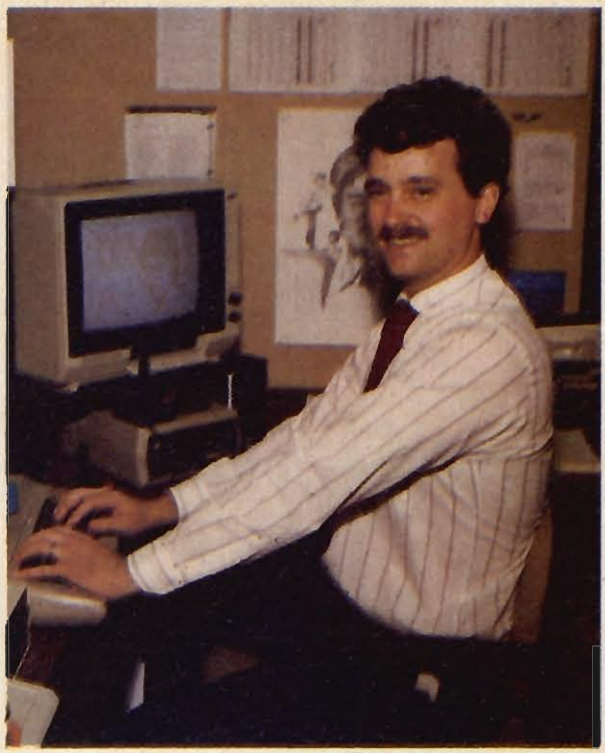 A picture of Kelly Day in his office, ca. 1984